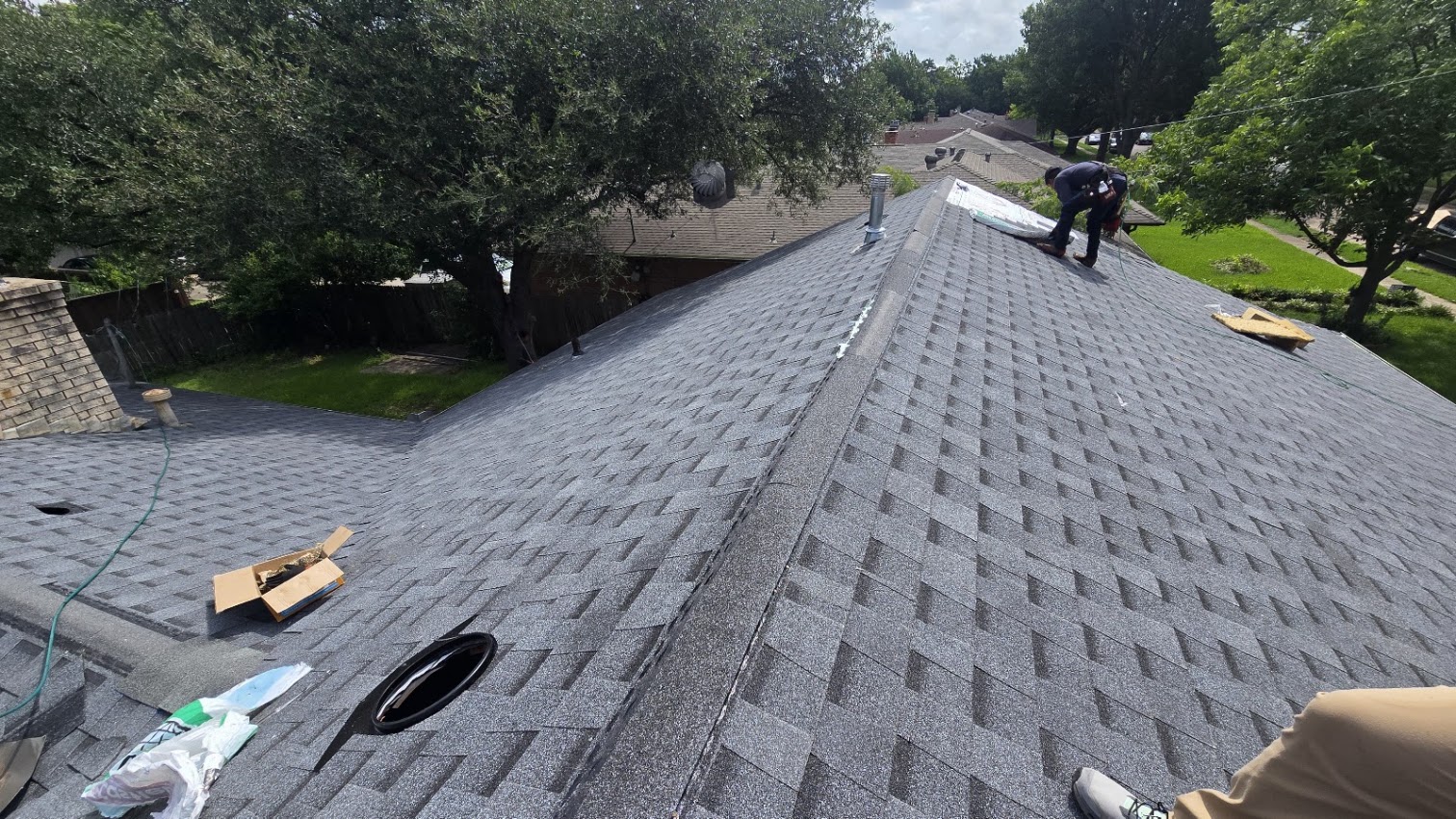 New gray architectural shingles installed by our crew